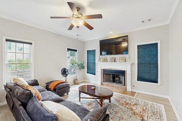 Spacious three-level home with game room, patio & cozy fireplace