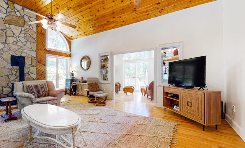 Fun getaway on three wooded acres with furnished deck & forest views