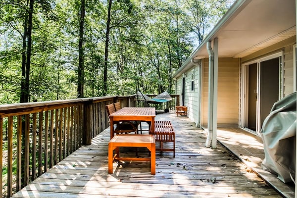 Fun getaway on three wooded acres with furnished deck & forest views