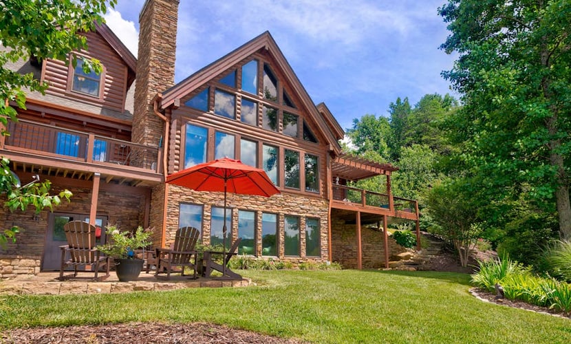 Luxe lakefront retreat with fishing dock, deck, firepit, patio & pool table