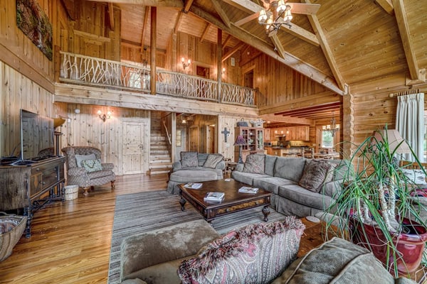 Luxe lakefront retreat with fishing dock, deck, firepit, patio & pool table