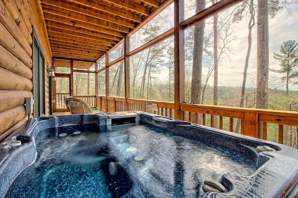 Secluded home on acreage with private hot tub, fireplace & wraparound deck