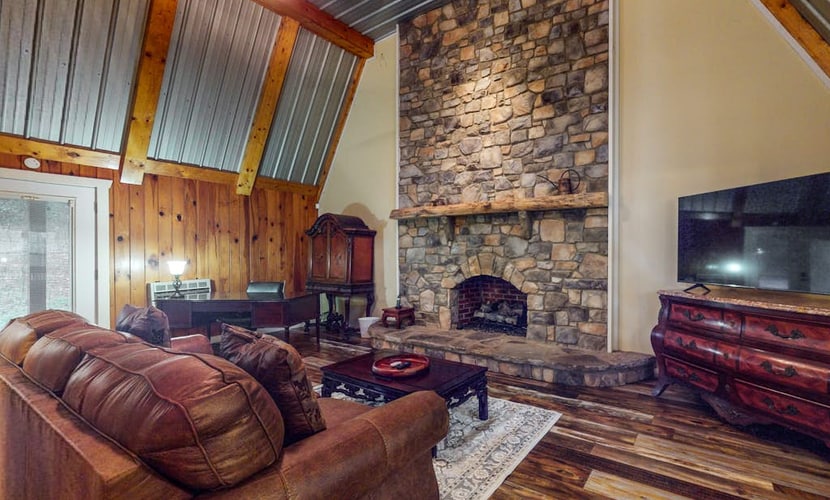 Charming log cabin with serene views, private pond, & cozy fireplace