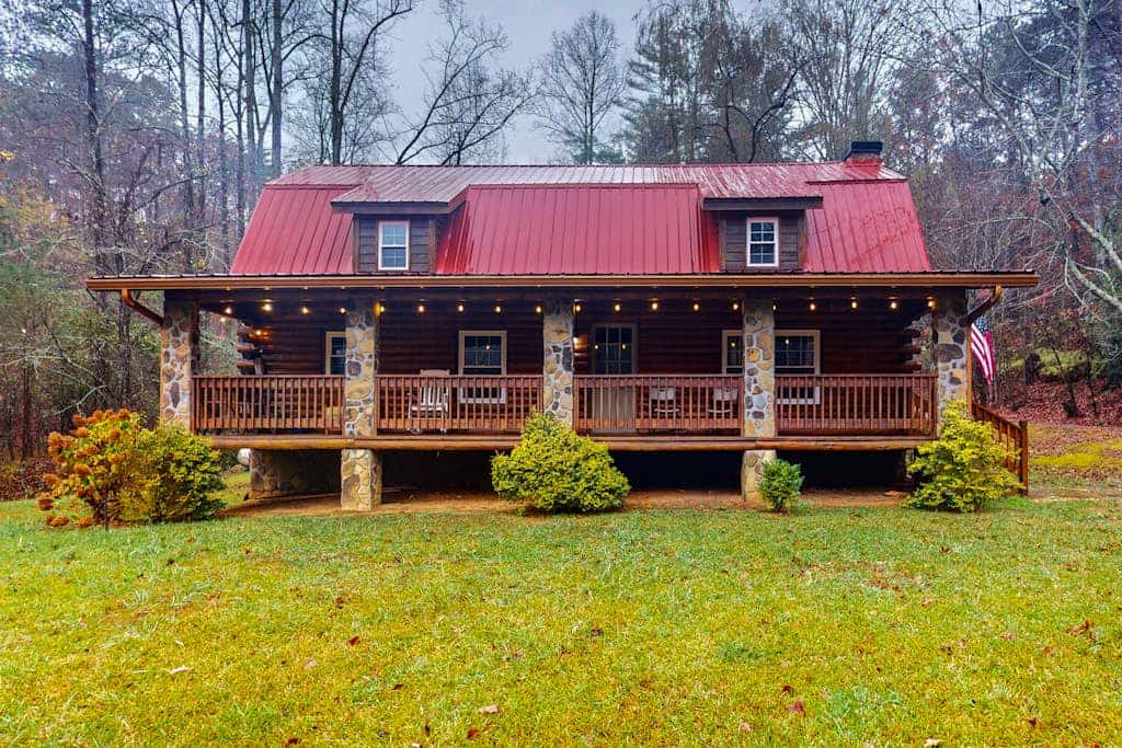 Charming log cabin with serene views, private pond, & cozy fireplace