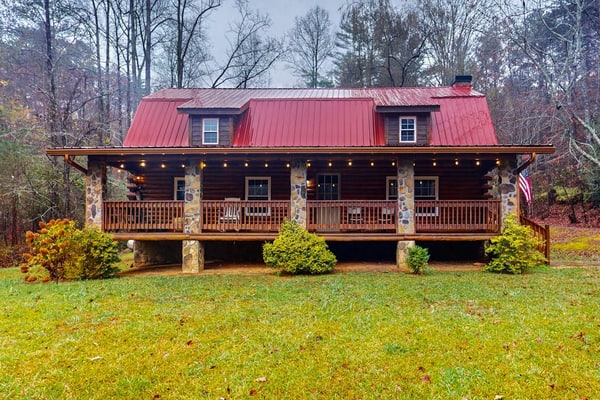 Charming log cabin with serene views, private pond, & cozy fireplace