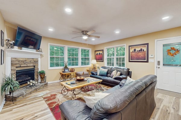 Spacious riverfront home with private dock, firepit & scenic outdoor space