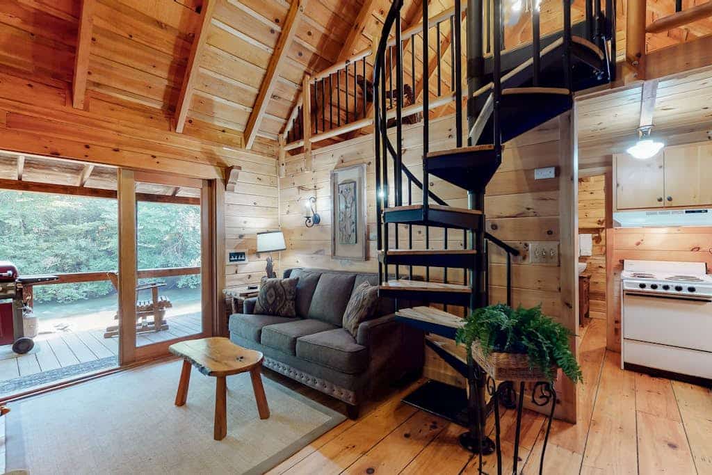 Dog-friendly waterfront cabin with a firepit & porch swing