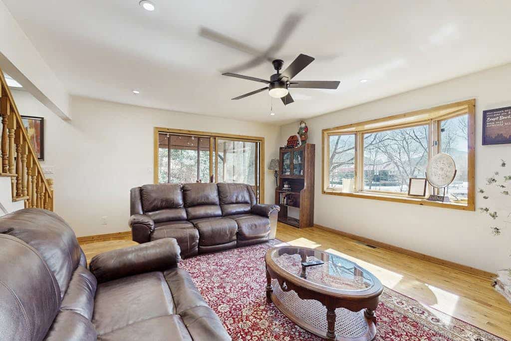 Upper-level riverfront condo with screened porch - near downtown