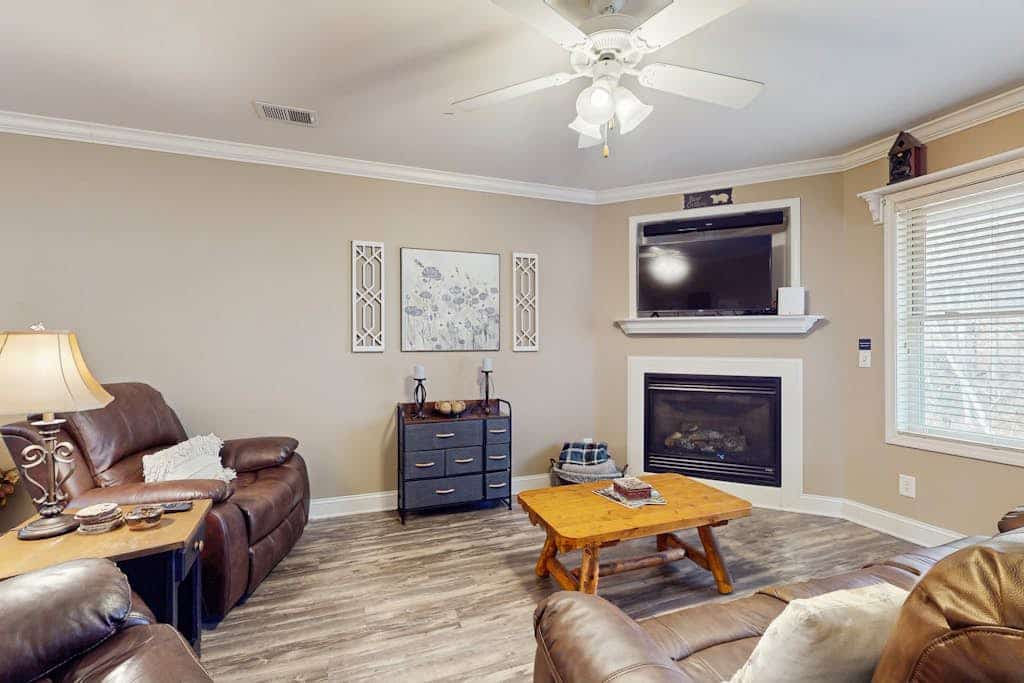 Riverfront oasis with dual suites, 3 fireplaces, central AC and walkable locale