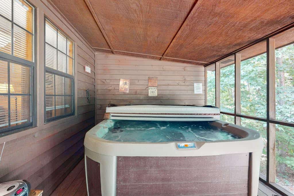 Dog-Friendly Cabin w/ Screened Deck, Private Hot Tub, Firepit & WiFi