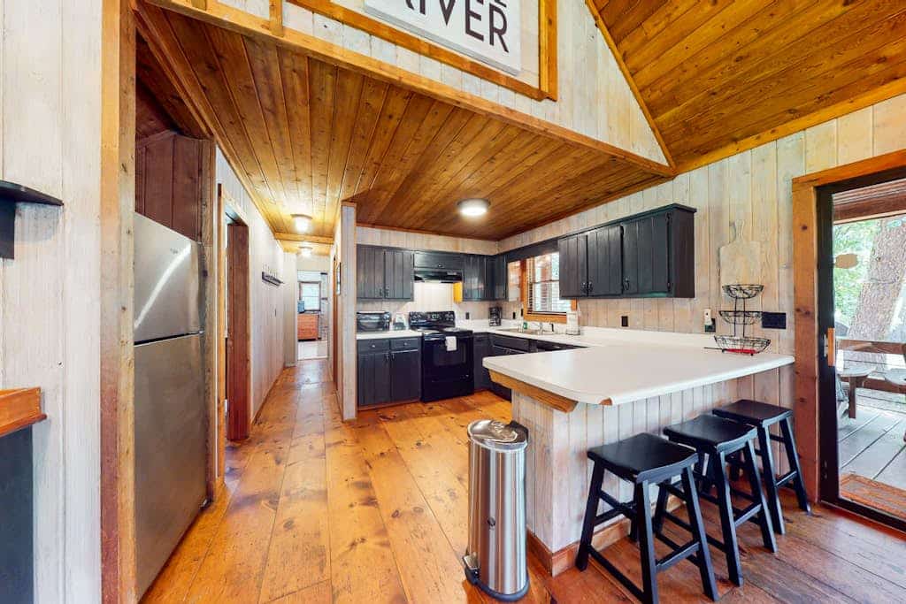 Waterfront cabin w/ private dock & hot tub, wood-burning fireplace, & swing