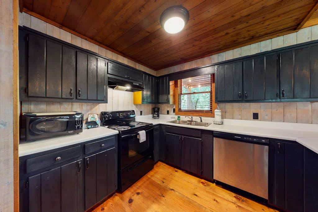 Waterfront cabin w/ private dock & hot tub, wood-burning fireplace, & swing