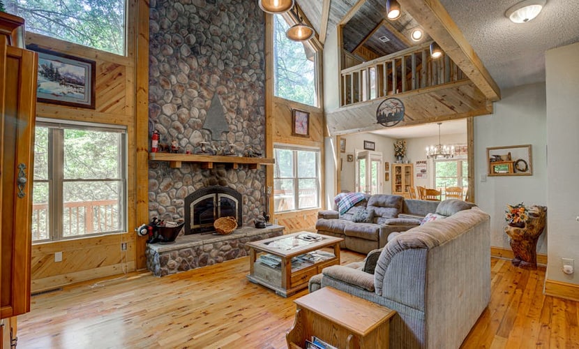 Dog-friendly riverfront cabin w/ waterfall view, large decks, firepit, Ping-Pong