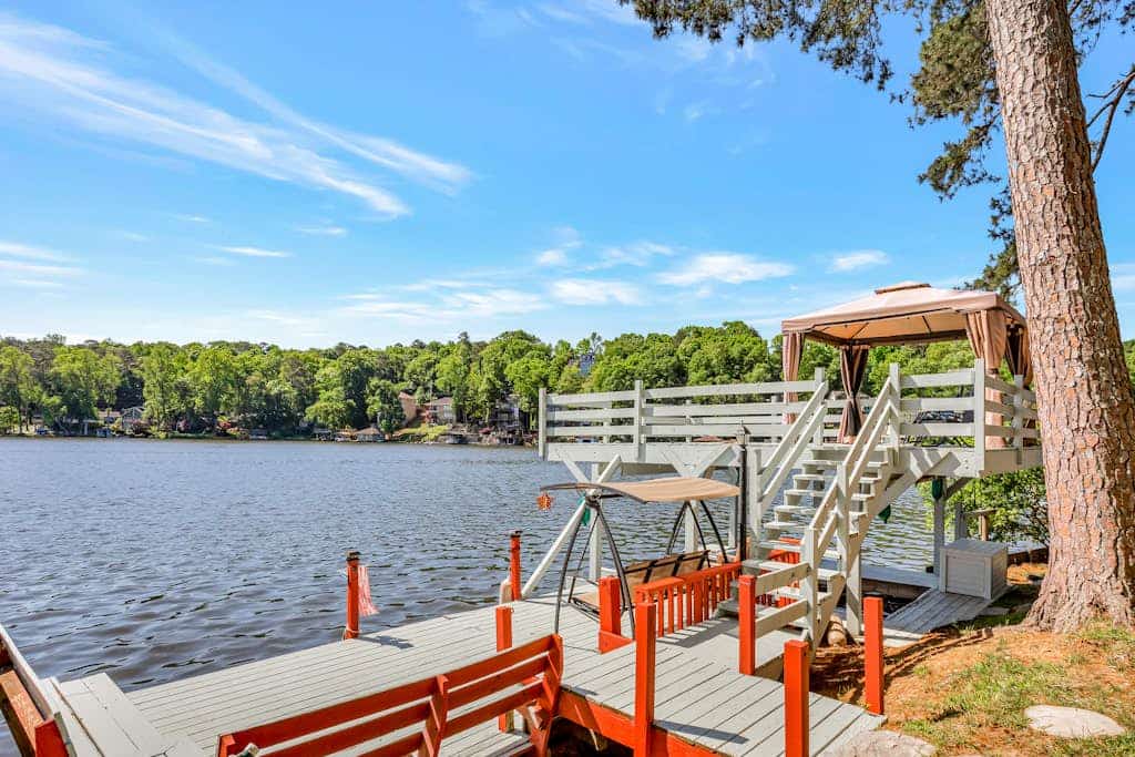 Dog-friendly lake house with dock, decks, firepit, grill, fireplace, & WiFi