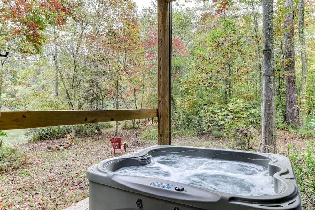 Peaceful Waterfront Mountain Retreat w/ Wood Burning Fireplace, Private Hot Tub