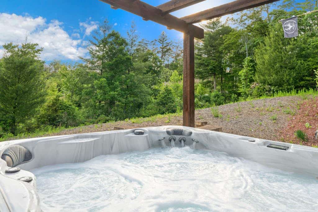 Luxury Mountain-View Cabin w/ Hot Tub, fireplace, W/D, game room, deck, & grill