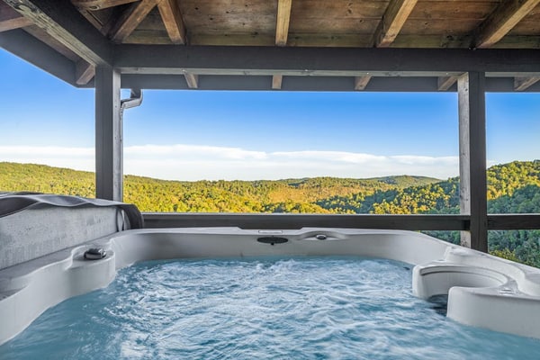 Long-range mountain views, wraparound deck, stunning decor, hot tub, star gazing