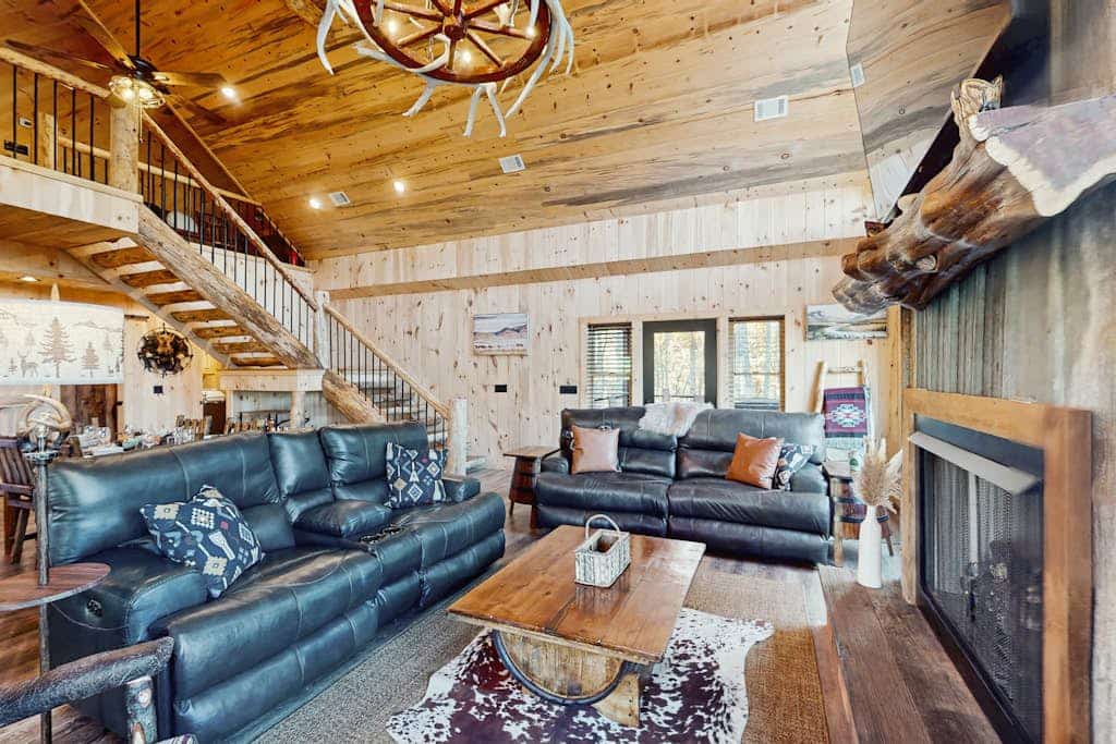 Cozy artisan cabin with hot tub, fire pit & copper-accent touches