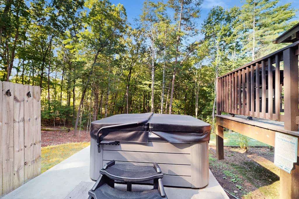 Cozy log cabin with hot tub, fire pit, and scenic screened porches