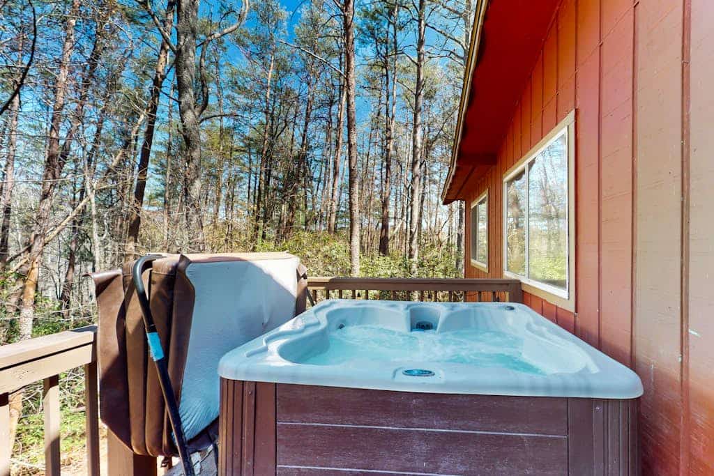 Rustic-modern mountain-view getaway with private hot tub, firepit, & fireplace