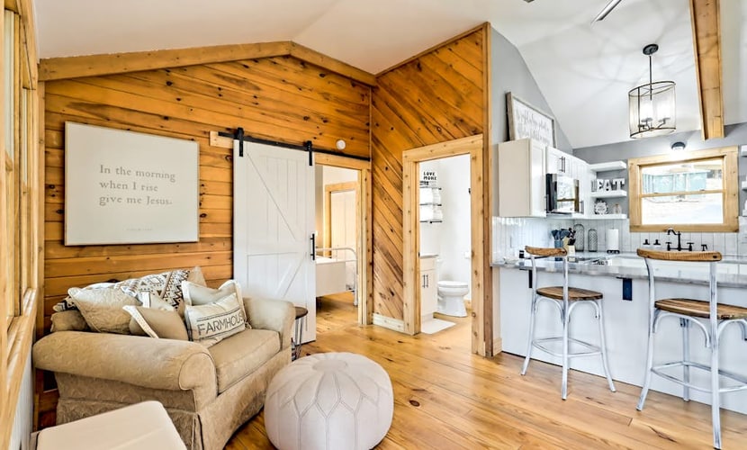 The Coop | Woodland cabin in Blairsville with wraparound porch & fireplace