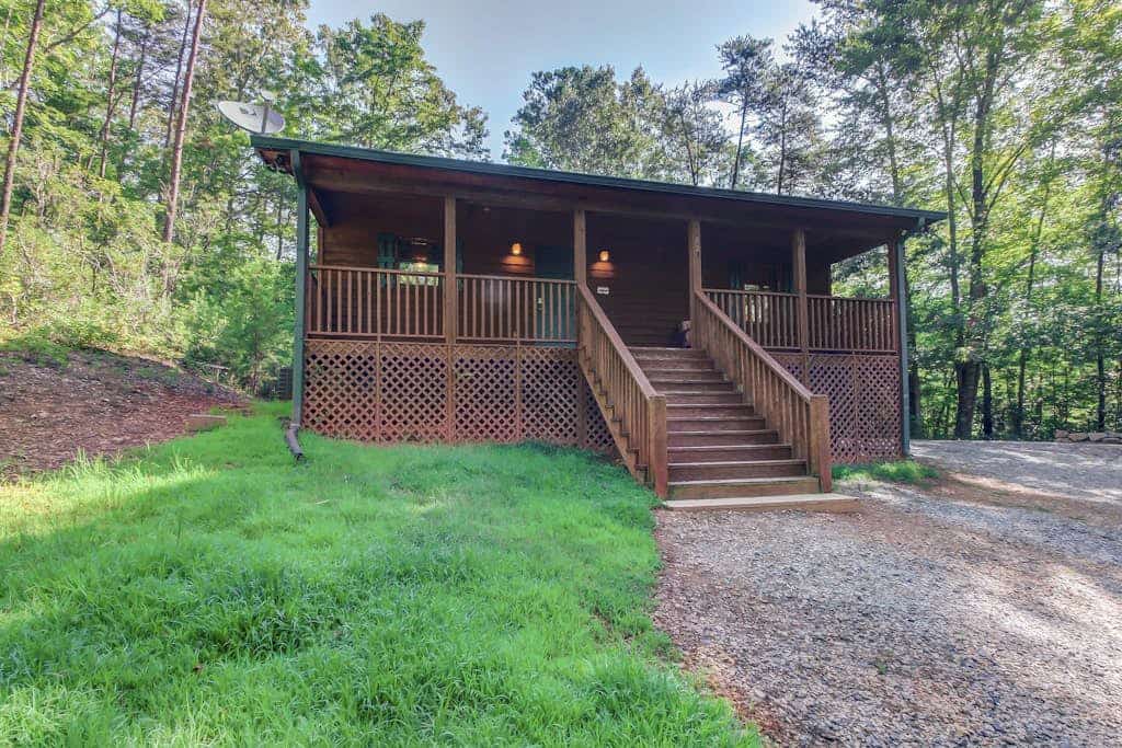Spacious Dog-Friendly Cabin with Screened Deck, Private Hot Tub, & Firepit