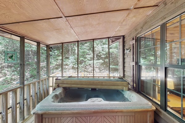 Dog-friendly cabin in the woods w/ private hot tub, screened-in deck & BBQ