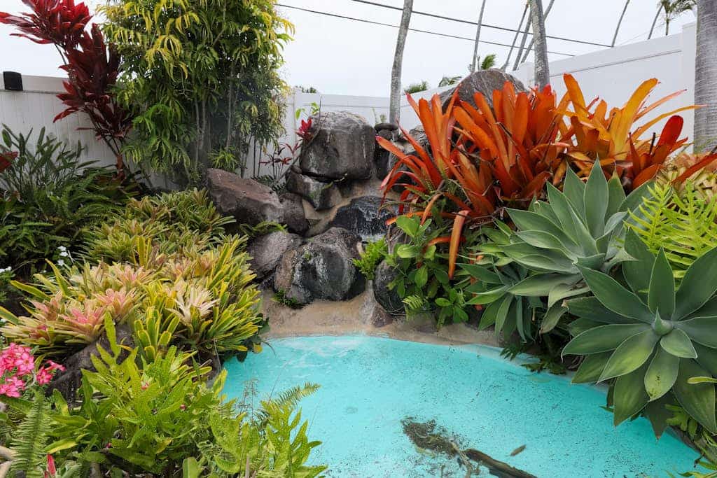 Updated tropical condo with great location, pool access, and central AC