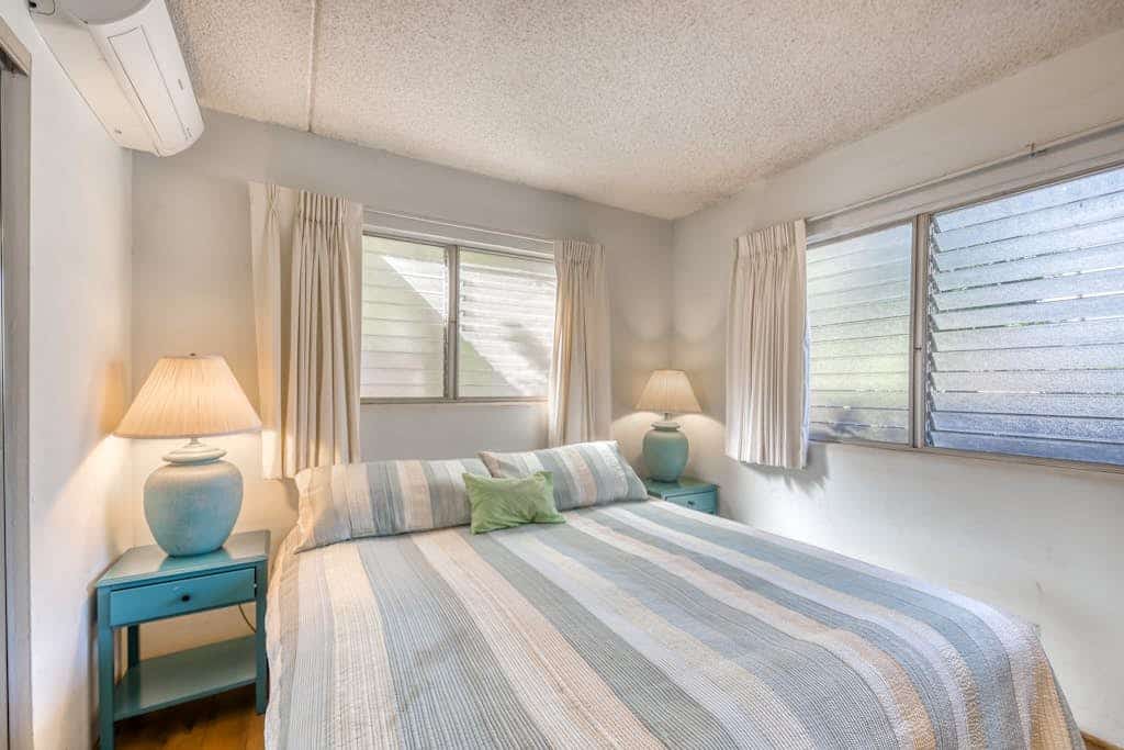 Welcoming condo with outdoor pool, grills, split AC, patio, & beach access