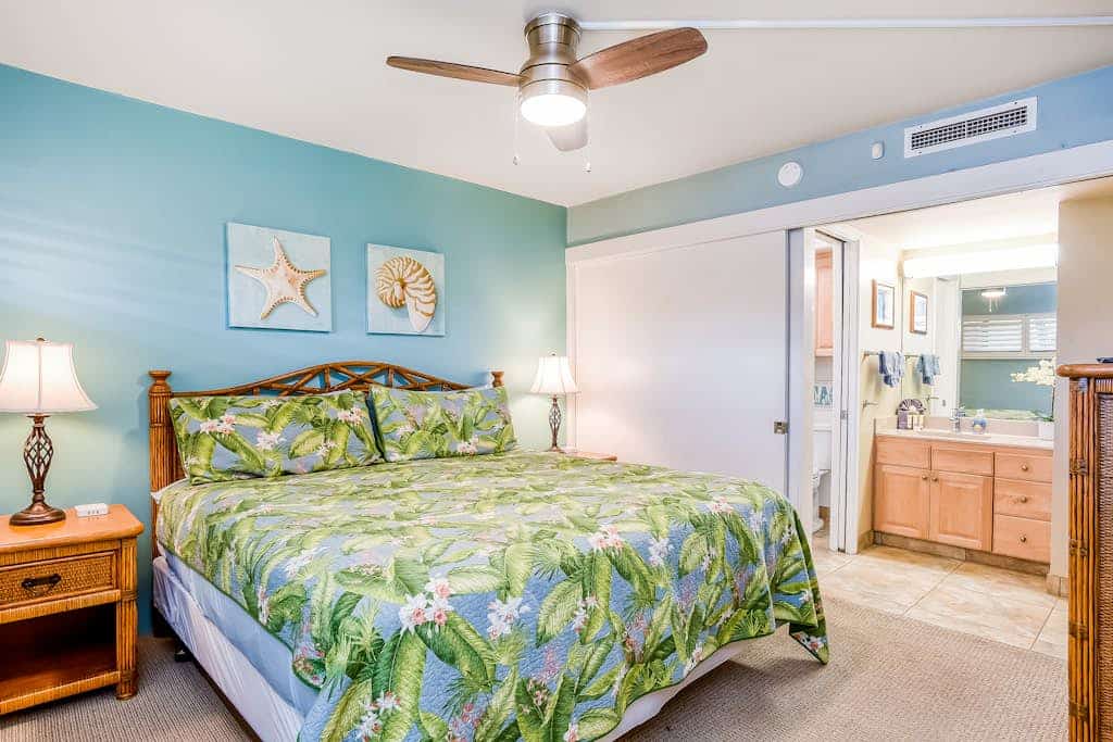 Colorful ground floor condo with A/C, bright interior, steps from the beach and private patio