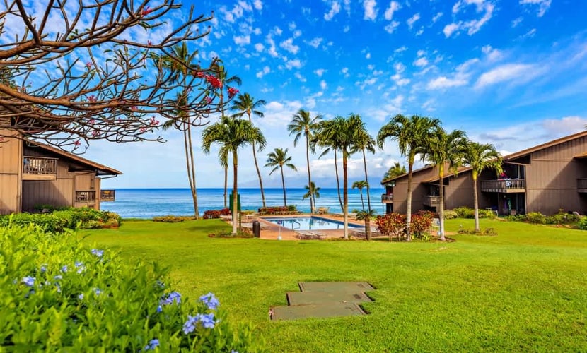 Second-Floor Oceanfront Condo w/Private Balcony, Free WiFi, Shared Pool & Grills