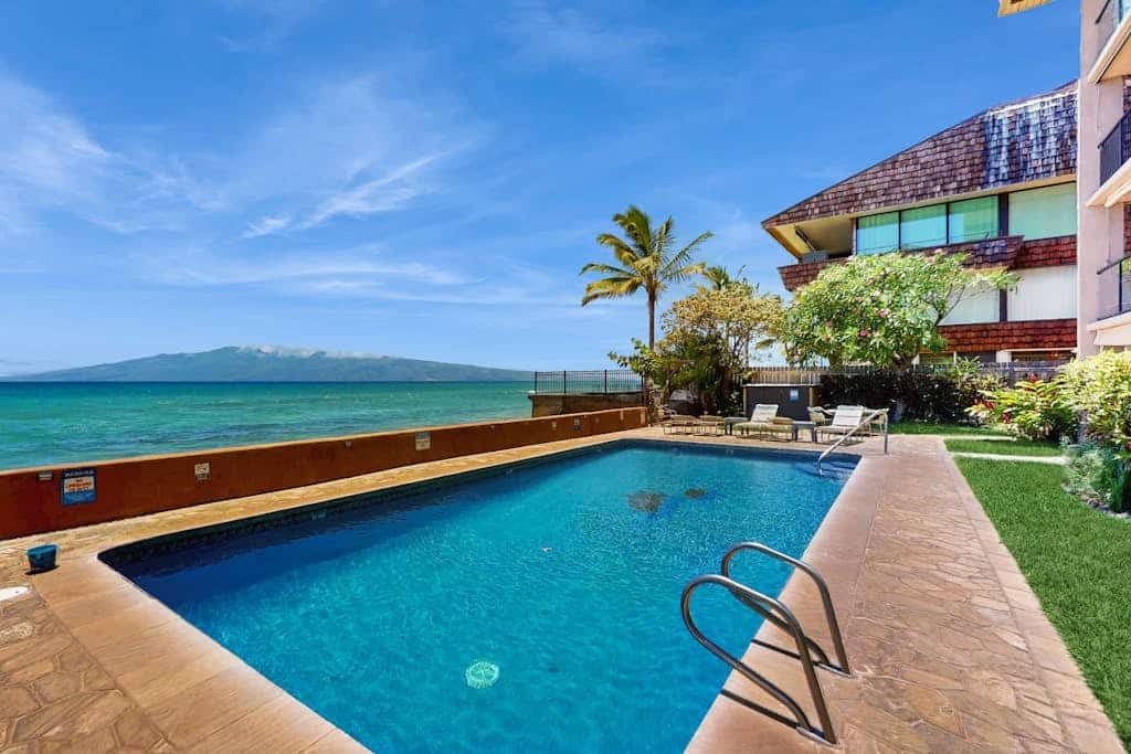 Oceanfront condo with ocean views, balcony, pool
