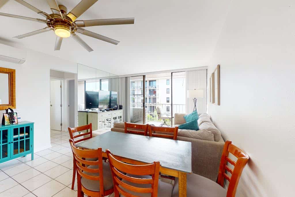 Top-floor condo with ocean-view balcony, central AC, washer/dryer, & shared pool