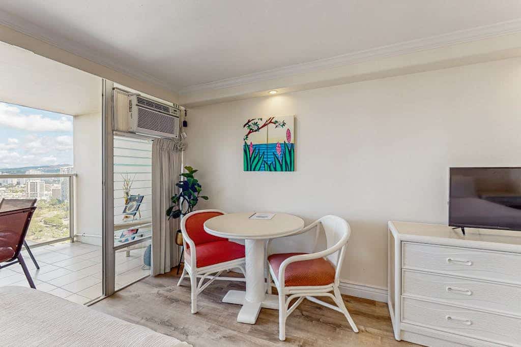 Spacious studio condo with private lanai, kitchenette, & shared pool