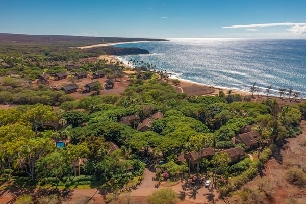 Colorful condo by the beach with a washer/dryer, lanai, & on-site pool