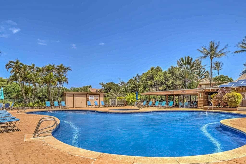 Beach/garden-view condo with wraparound lanai, pool, tennis courts, & hot tub