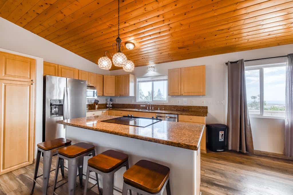 Newly updated home with pools, lanai, ocean view - walk to golf