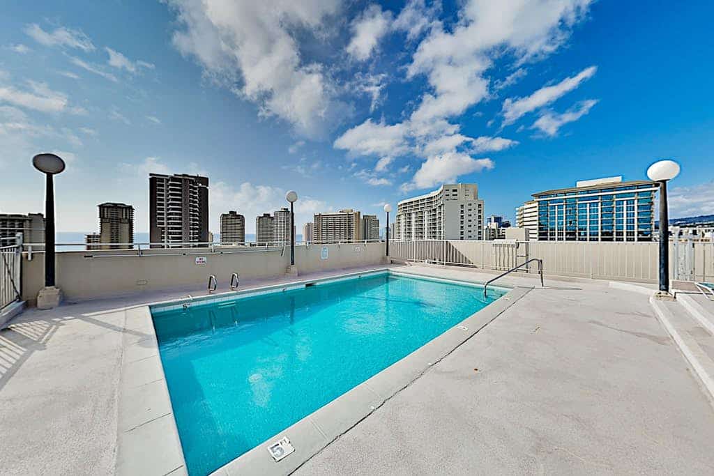 Mountain/city-view condo with rooftop pool, balcony, & W/D - 30-night minimum