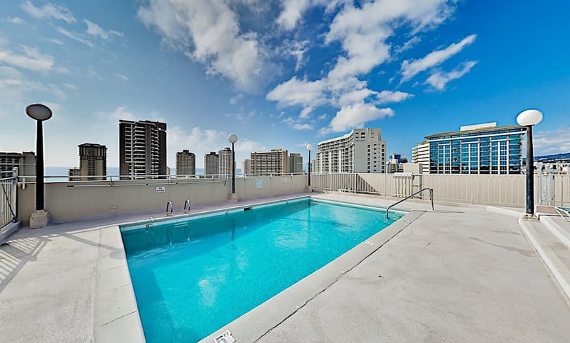 Mountain/city-view condo with rooftop pool, balcony, & W/D - 30-night minimum