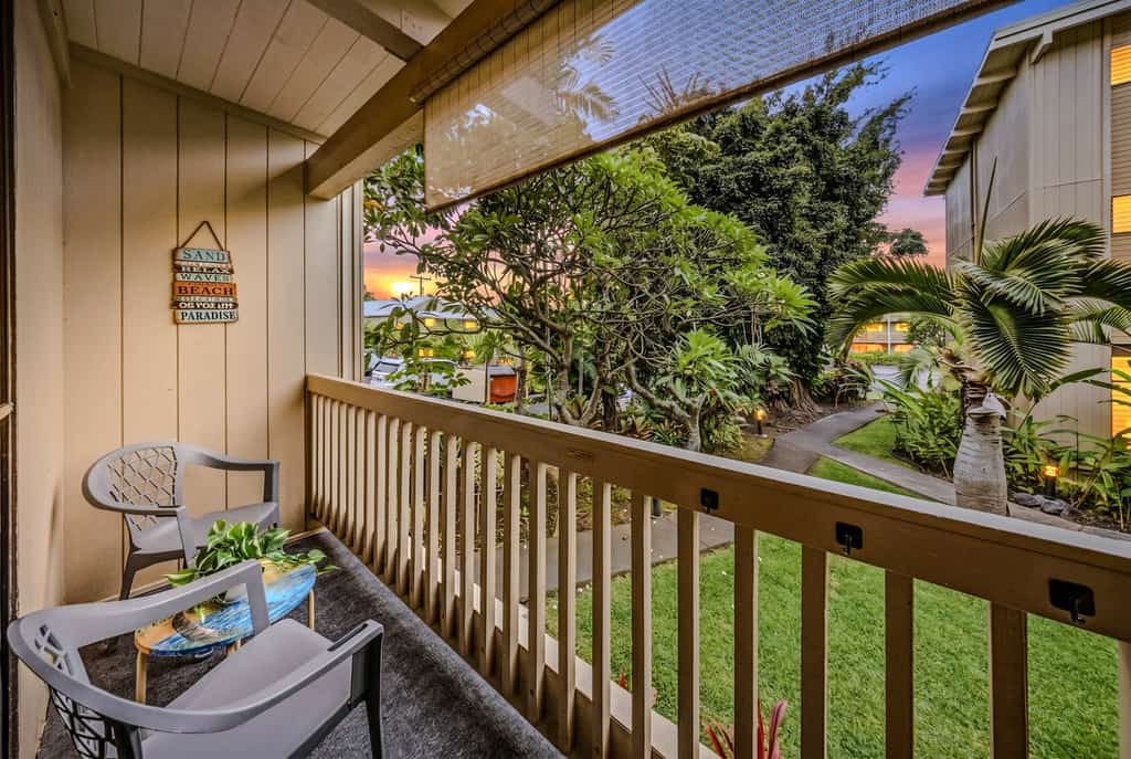 Wake to birdsong and palms from your private lanai. Easy first-floor living across from the ocean, with a tropical garden view, pool and hot tub, and Alii Drive's beaches and poke a short stroll away.
