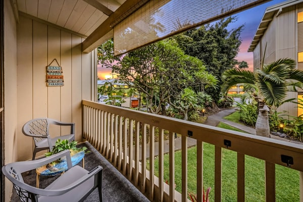 Wake to birdsong and palms from your private lanai. Easy first-floor living across from the ocean, with a tropical garden view, pool and hot tub, and Alii Drive's beaches and poke a short stroll away.