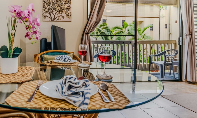 Wake to birdsong and palms from your private lanai. Easy first-floor living across from the ocean, with a tropical garden view, pool and hot tub, and Alii Drive's beaches and poke a short stroll away.