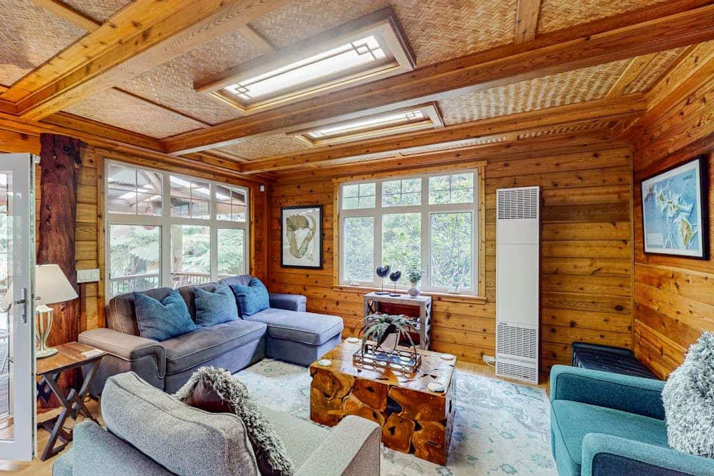 Serene 5-acre tropical hideaway with lanai and circular wood-burning fireplace
