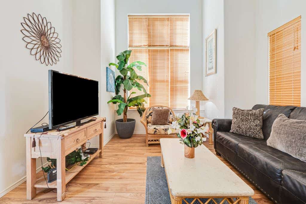 Two-story condo with 2 lanais, pools, hot tubs, tennis & gym - near beach/golf