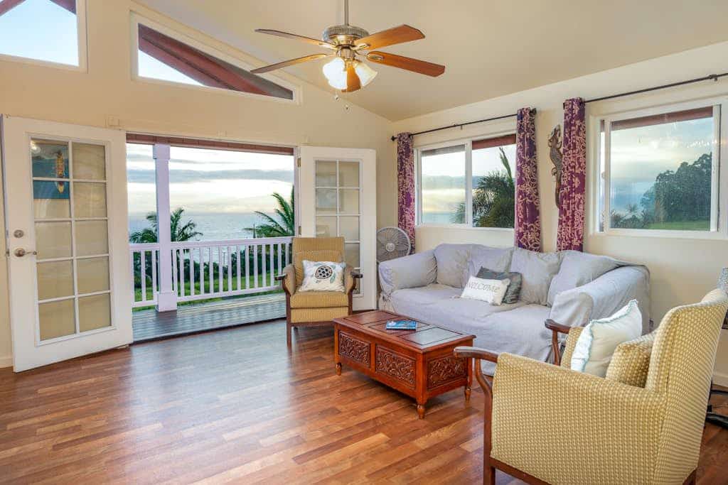 Spectacular two-story ocean-view home on two acres with covered lanai
