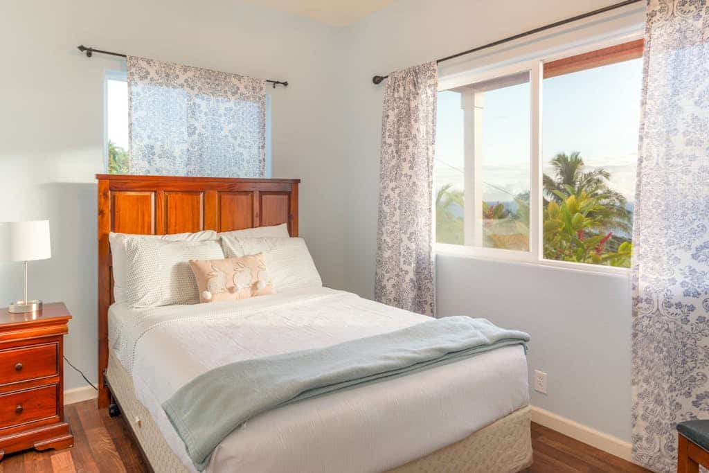 Spectacular two-story ocean-view home on two acres with covered lanai