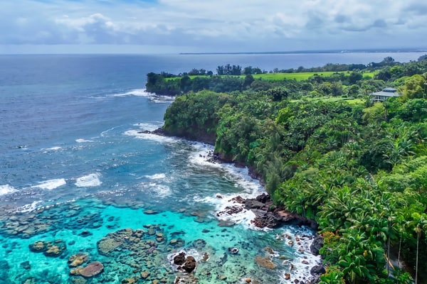 Spectacular two-story ocean-view home on two acres with covered lanai