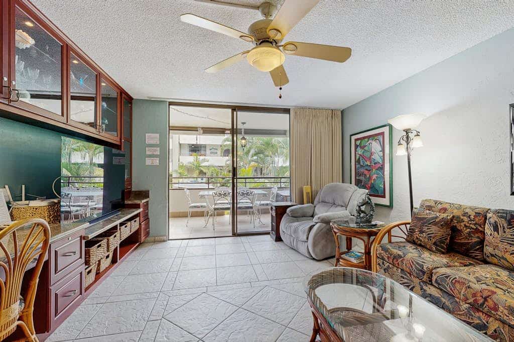 Relaxing condo near beach with partial ocean views, hot tub, pool, & lanai