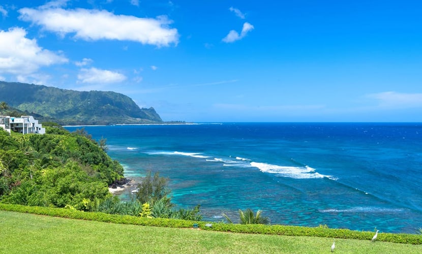 Spacious home with charming views from lanai - walk to the beach