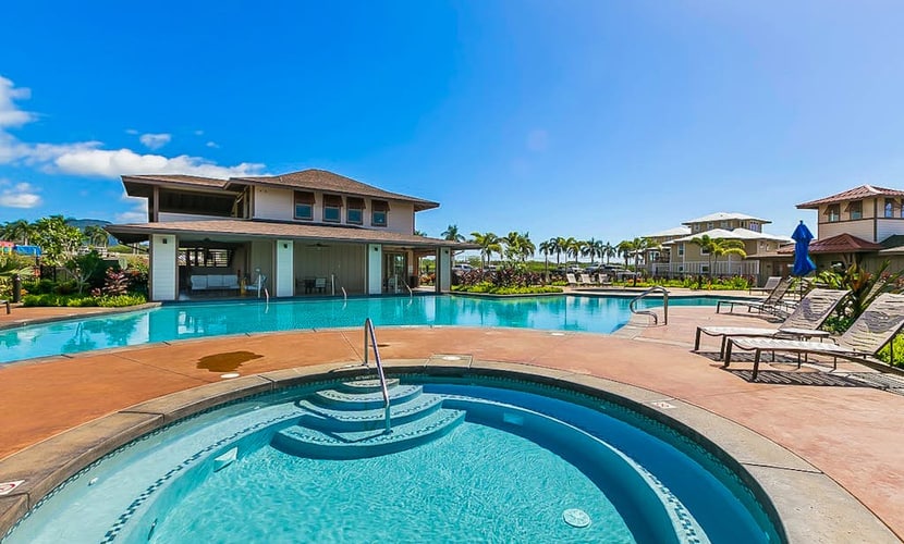Ocean + mountain view home with WiFi, lanai, onsite pool, & hot tub